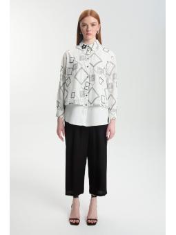 Tunique écrue détaillée d’accessoire à motifs géométriques T-1574